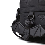 Shinigami Couture black leather bag detail showing Beep the Bat charm