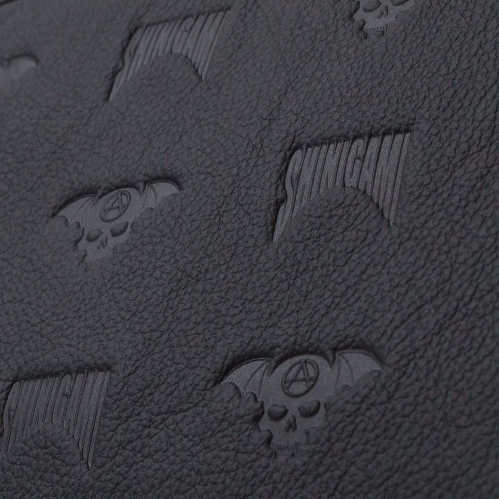 Close-up of Shinigami Couture black embossed leather pattern texture