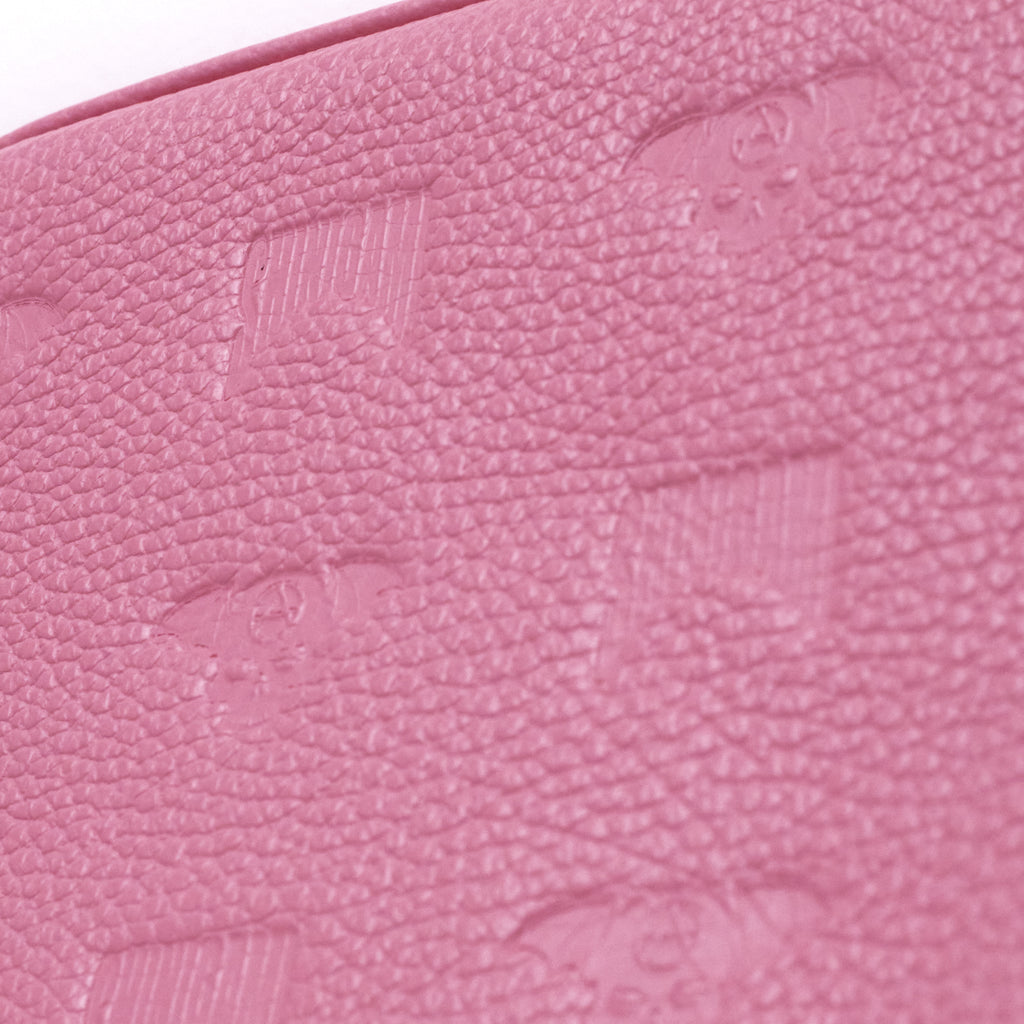 Close-up of Shinigami Couture pink embossed leather pattern texture