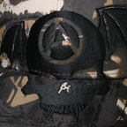 Shinigami Couture camouflage bobby cap front skull and bat embroidery detail