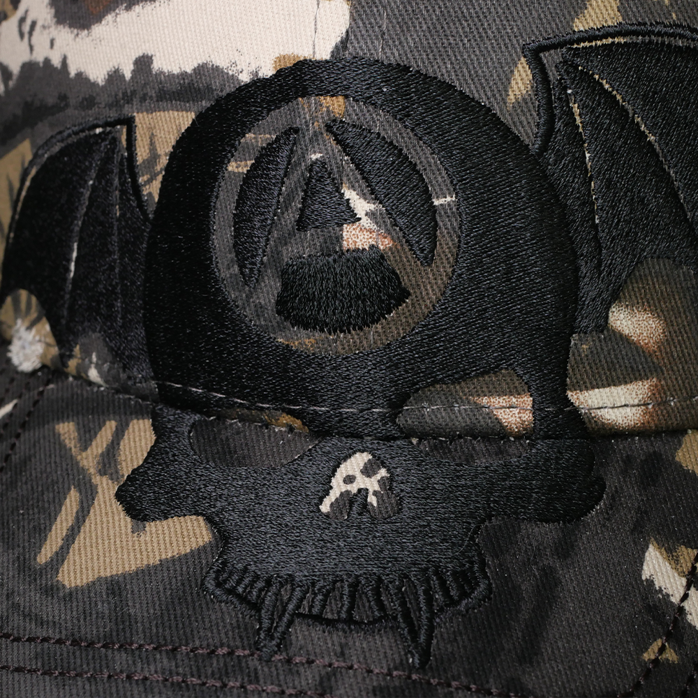Shinigami Couture camouflage bobby cap front skull and bat embroidery detail