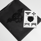 Shinigami Couture branded black packaging bag and sticker sheet pack