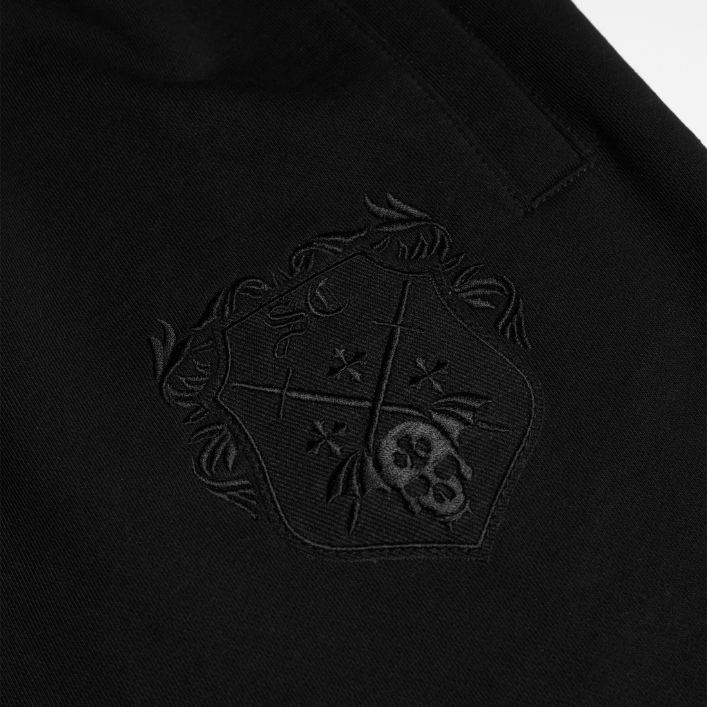 Shinigami Couture black shorts chest coat of arms logo embroidery detail