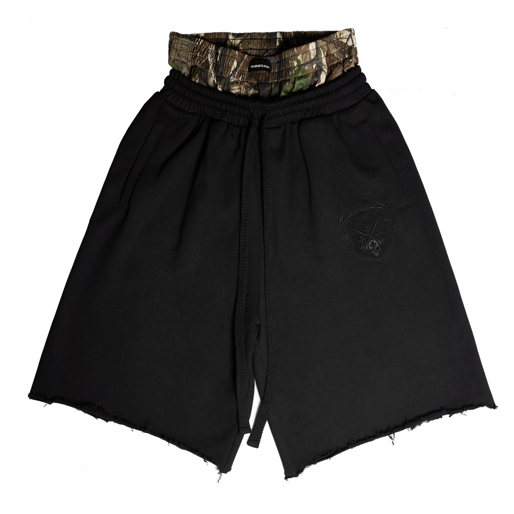 Shinigami Couture black coat of arms double-waisted shorts with camouflage waistband