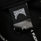 Shinigami Couture black cap interior label and branding detail
