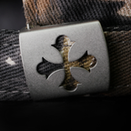 Shinigami Couture camouflage cap with cross-shaped metal buckle hardware detail