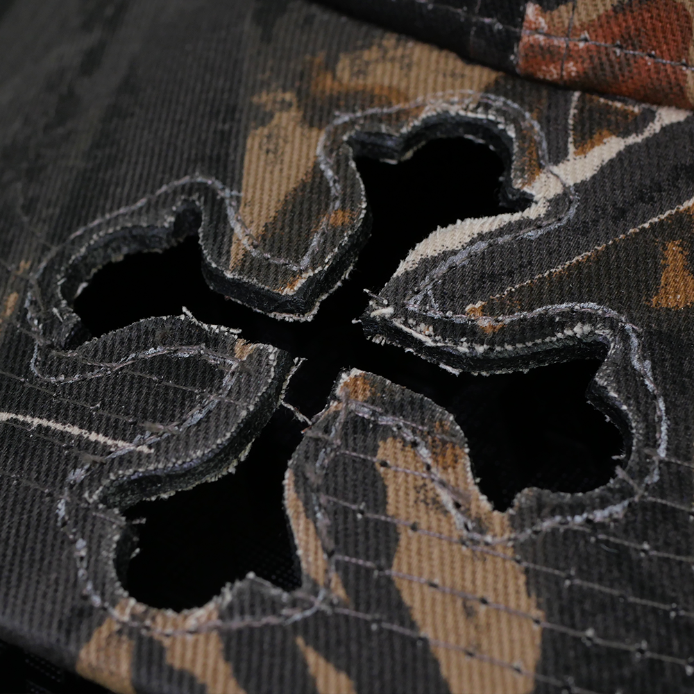 Shinigami Couture camo cap cross cut-through brim detail with frayed edges
