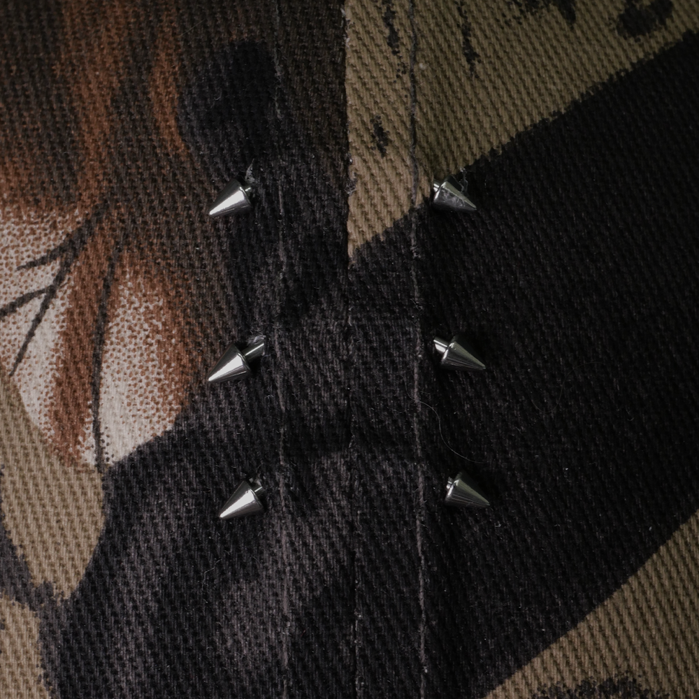 Shinigami Couture camo cap front panel piercing and metal studs detail