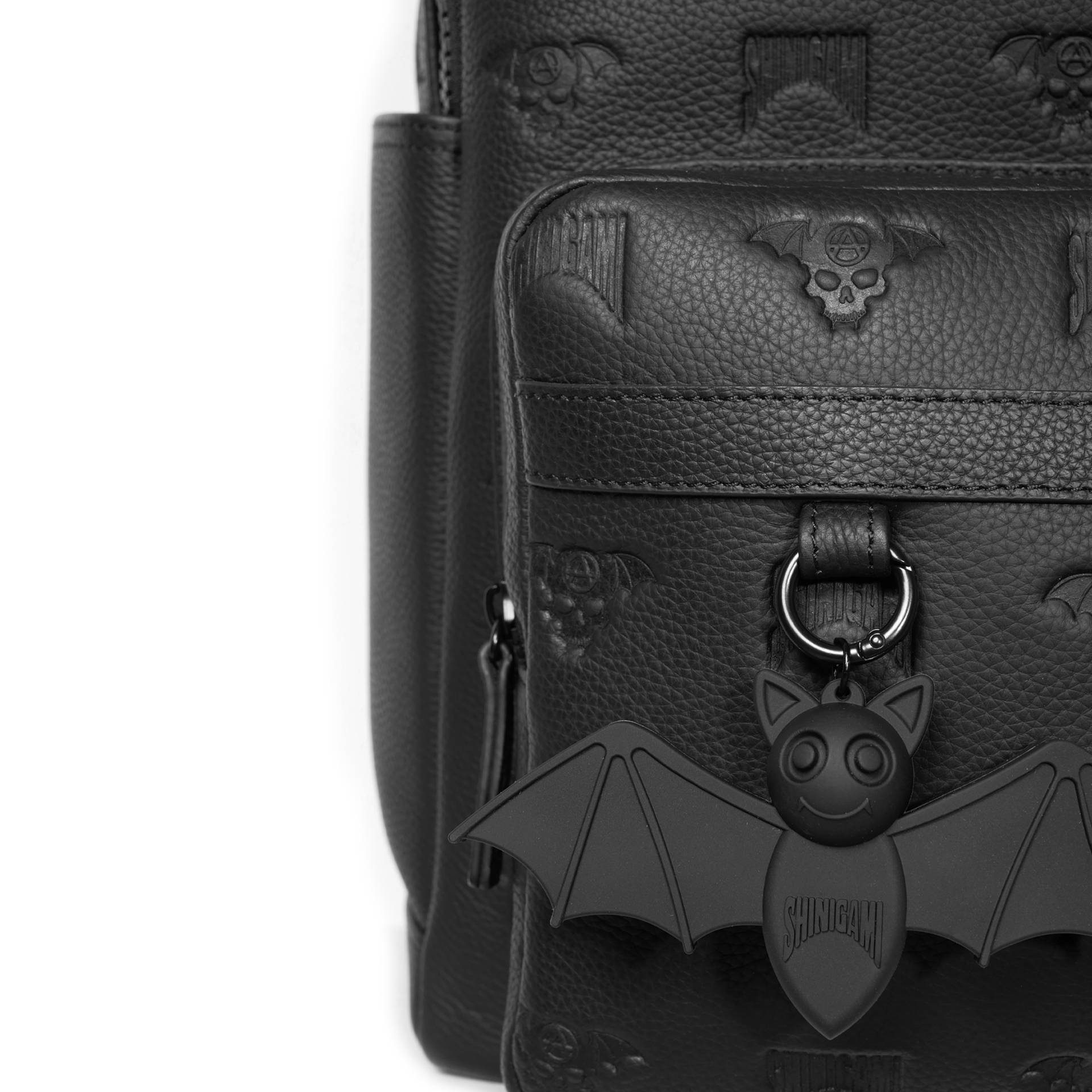 Shinigami Couture leather backpack front pocket with signature rubber bat keychain