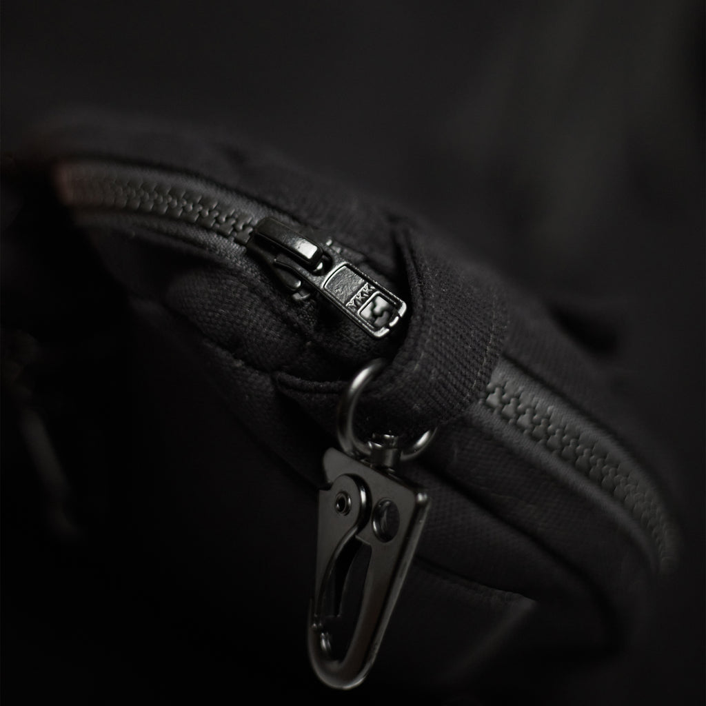 Shinigami Couture cargo shorts YKK zipper and metal clasp hardware detail