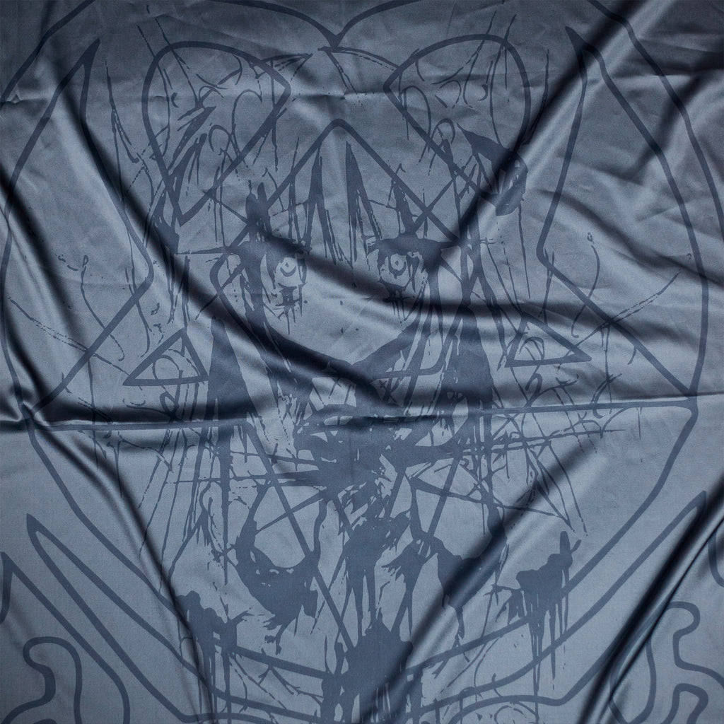 Close-up of Shinigami Couture dark crusader silk shawl folded fabric texture